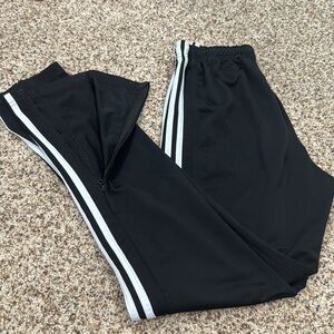 Adidas track pant with zippered leg opening